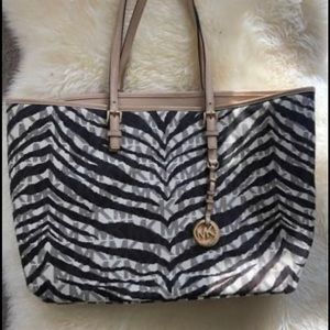 Michael Kors Zebra Canvas tote w padded laptop zipper pouch in the middle.